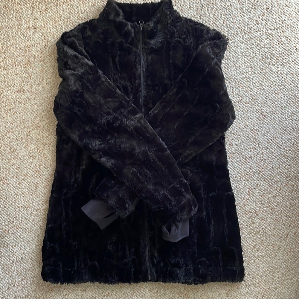 Beautiful and warm snow angel faux fur coat.